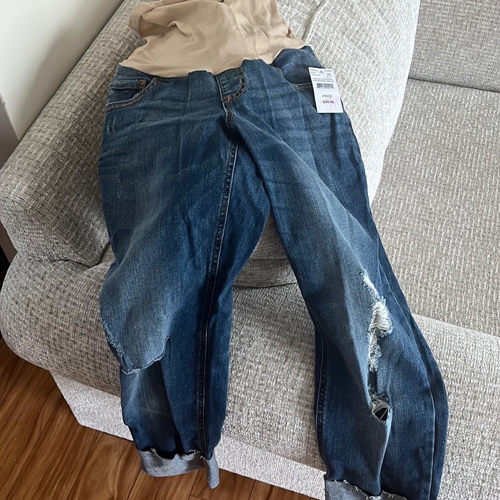 Maternity cropped pants with rips in knee.